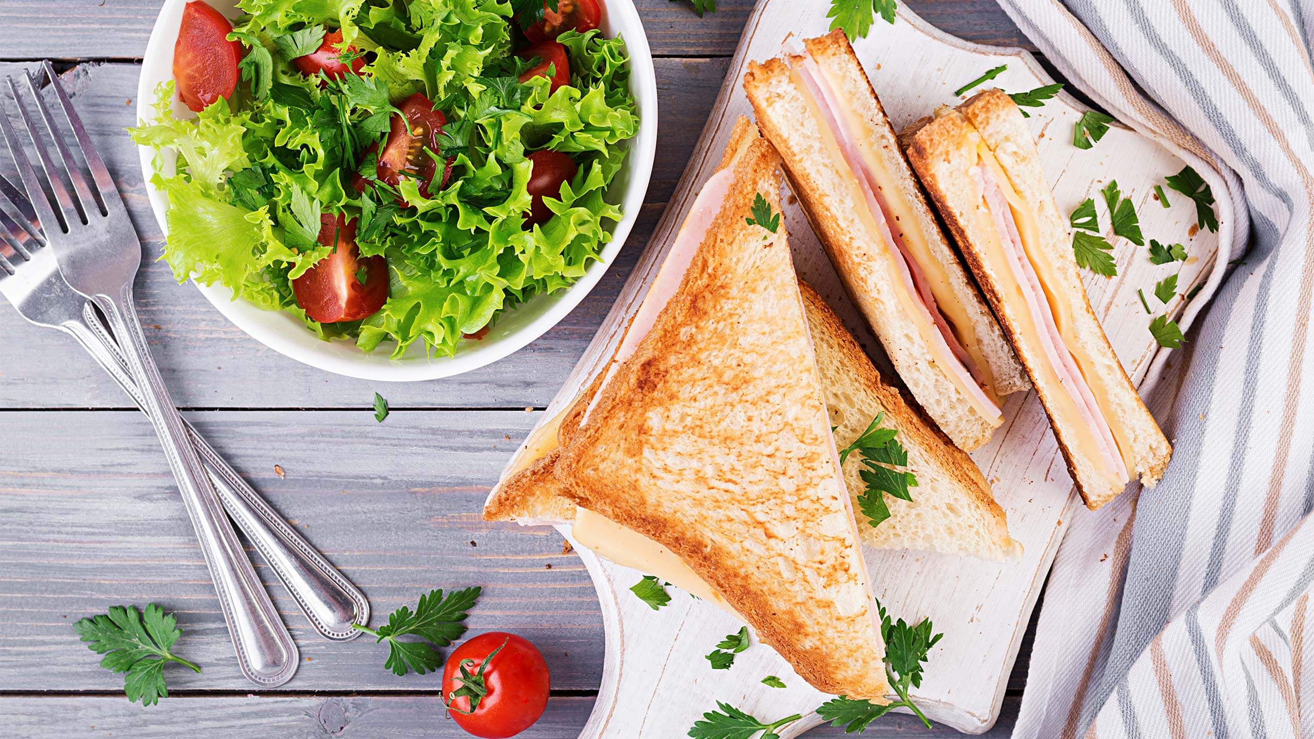Sandwich with ham cheese and salad